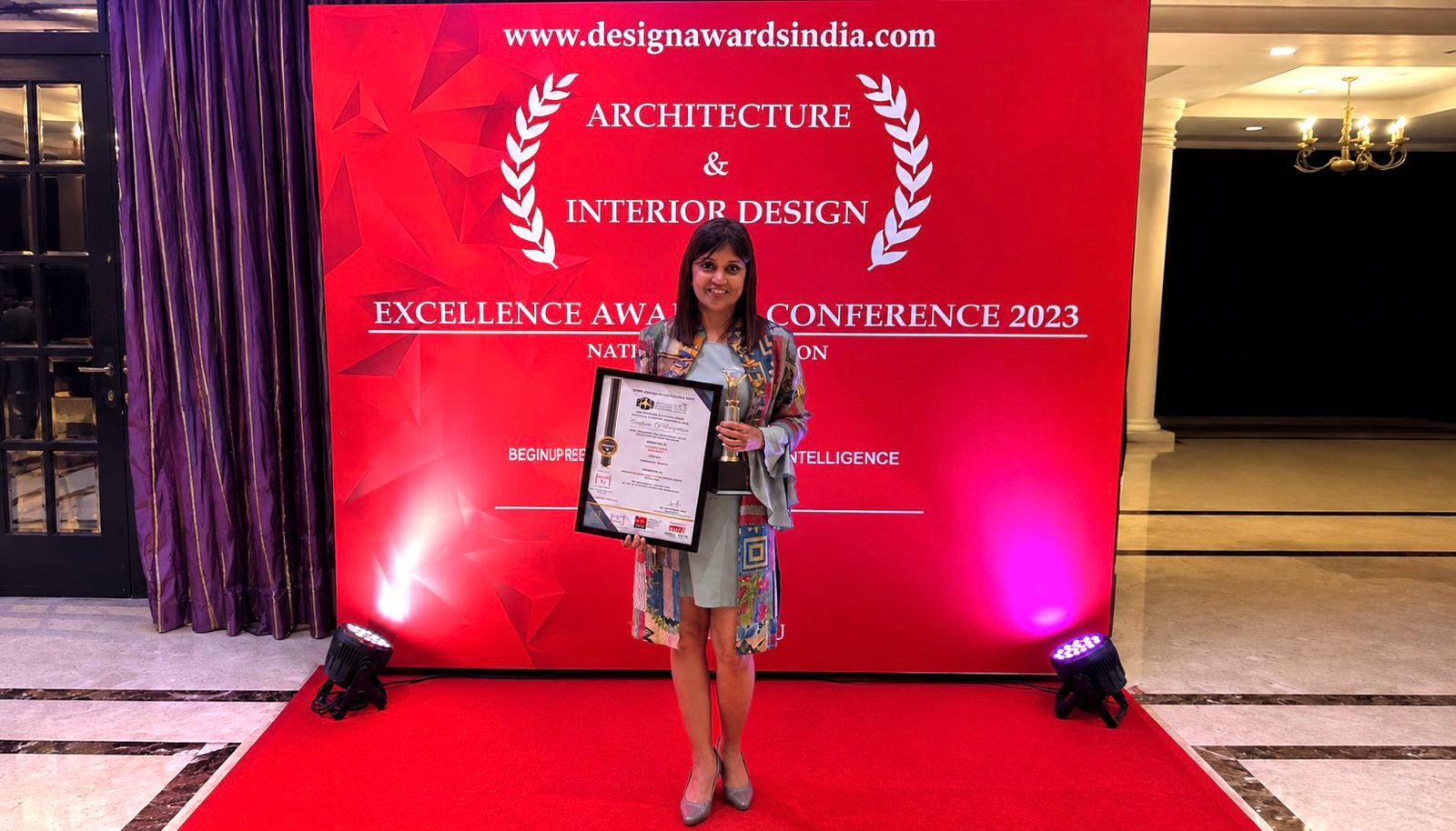 Neha Vikram receiving an Architecture and Interior Design Excellence Award